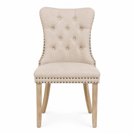 Silla tapizada de lino beige con patas de madera de roble